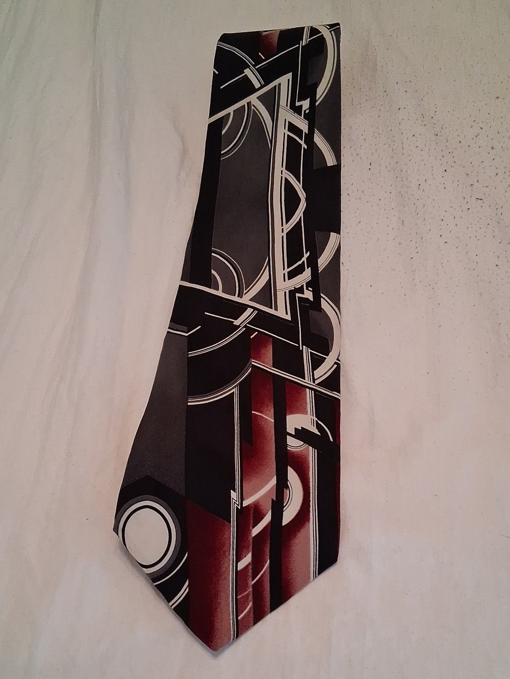 Vintage Pierre Cardin Black, Gray and Burgundy Geometric Silk Tie. Elegant